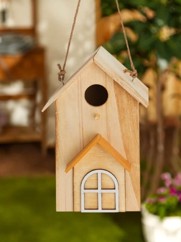 Hanging or stand-alone birdhouse!  Crafted from natural plywood, this birdhouse is durable and sturdy to keep your bird visitors sheltered and warm in any weather conditions. Providing a safe place for birds to nest, feed, or rest and attracting these peaceful creatures with soothing chirps into your garden, this birdhouse is a gift to both the birds and yourself. Comes in 3 designs: white door, white fence and white window.