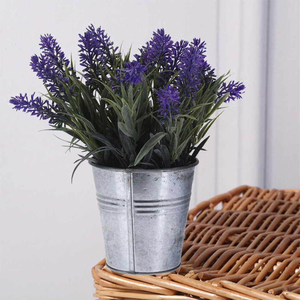 Eco lifestyle - ecolifestyle.shop These artificial lavender plants in a zinc pot will help turn your lively garden and home into the focal point of your home’s landscaping.  6 x designs. Comes with a beautiful rustic zinc pot plant. Can be used for indoor decoration and outdoor furniture. Size: 10 x 10 x 24cm. Material: Polypropylene and Zinc. 317002740 - 8719202387971