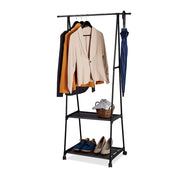 Portable 62cm Metal Clothes Rack with 2 Shelves on Wheels with stopper for storing and hanging your clothes in a bedroom. Holds jackets, hats, shoes, pants and other apparel. Has 4 wheels for easy maneuverability. Made in black powder-coated finish metal frame. Has a holder for hangers and two shelves. Size: 55-85 x 45 x 157cm. Eco lifestyle online shop