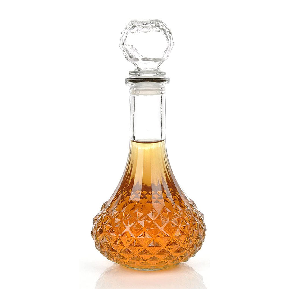 Diamond cut Whiskey decanter with airtight Lid 550ml, 18.60oz capacity. Ideal for bars, home bars, restaurants and events. The airtight lid seal protects the whiskey, brandy, wine, water, juice and liquor from external influences and prevents leaking. Preserves the flavours and aromas of your drink. 24 x 11.5cm. YE7300790 Eco lifestyle online shop